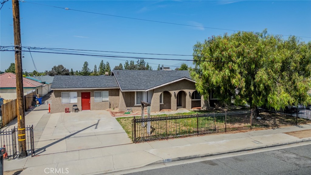 732 South Acacia Avenue Rialto, CA 92376 - Photo 24 of 30 a view of a house with a patio