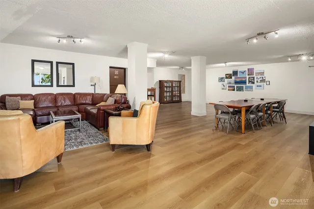 an aerial view of a house with garden space and swimming pool