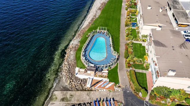 a view of swimming pool from a balcony