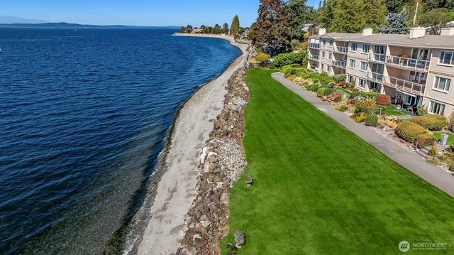 a front view of a building with a lot of windows