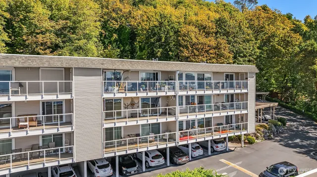 a front view of a building with a lot of windows