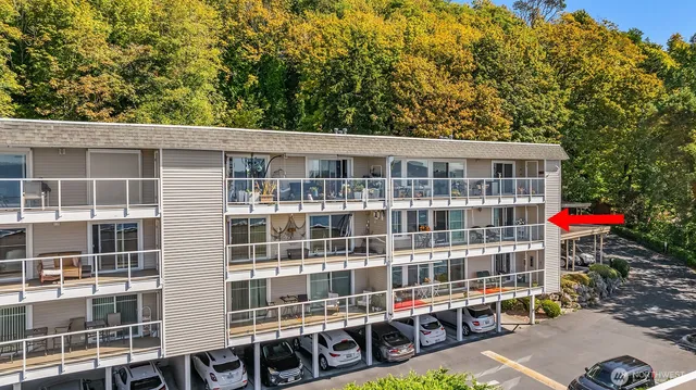 a front view of a building with a lot of windows