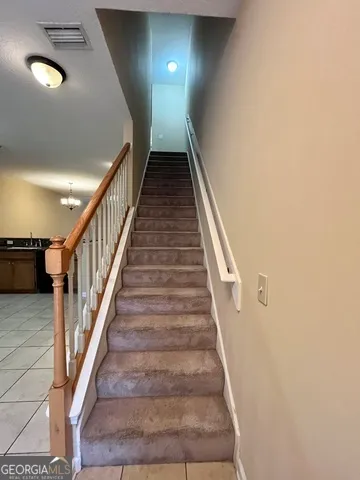 a bathroom with a glass door shower