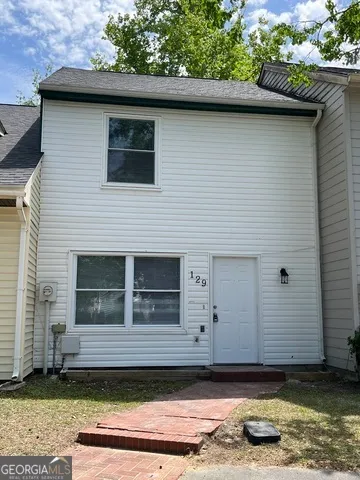 a view of closet area with empty racks