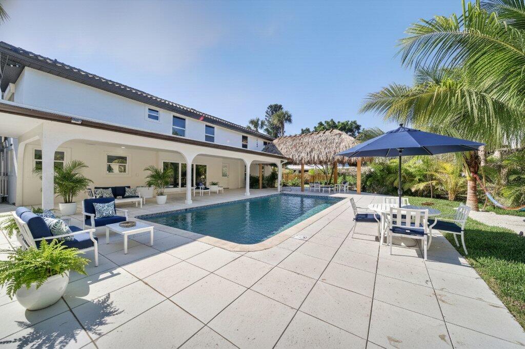 37 East High Point Road Sewall's Point, FL 34996 - Photo 51 of 58 outdoorliving_staged1.jpg-SMALL