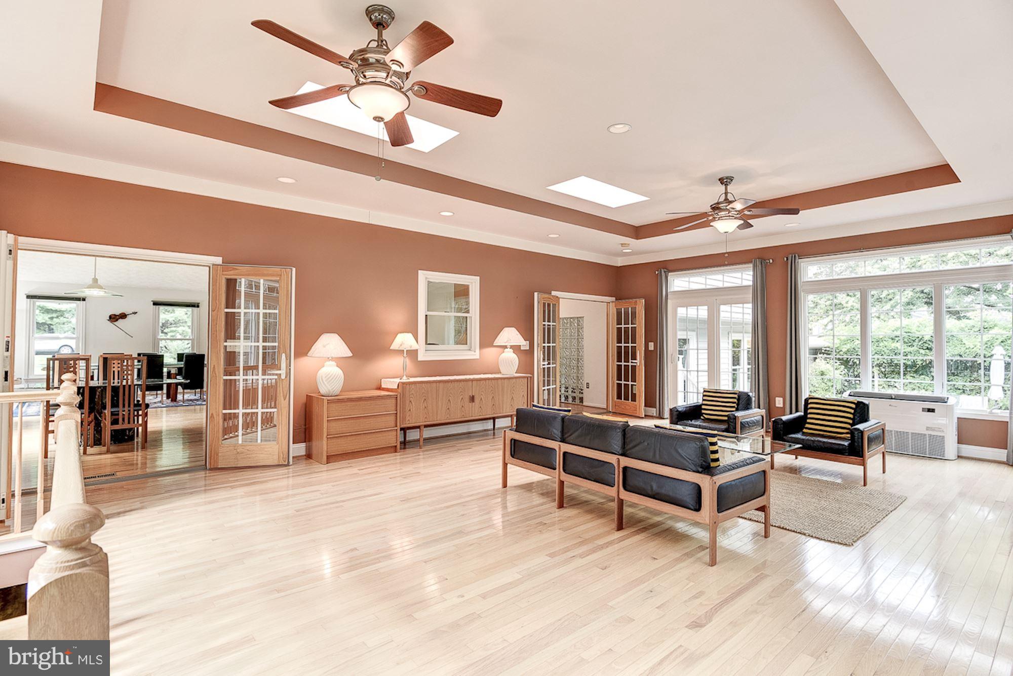 3221 Sharp Road Glenwood, MD 21738 - Photo 16 of 53 Great Room | Tray Ceiling | Access to Backyard