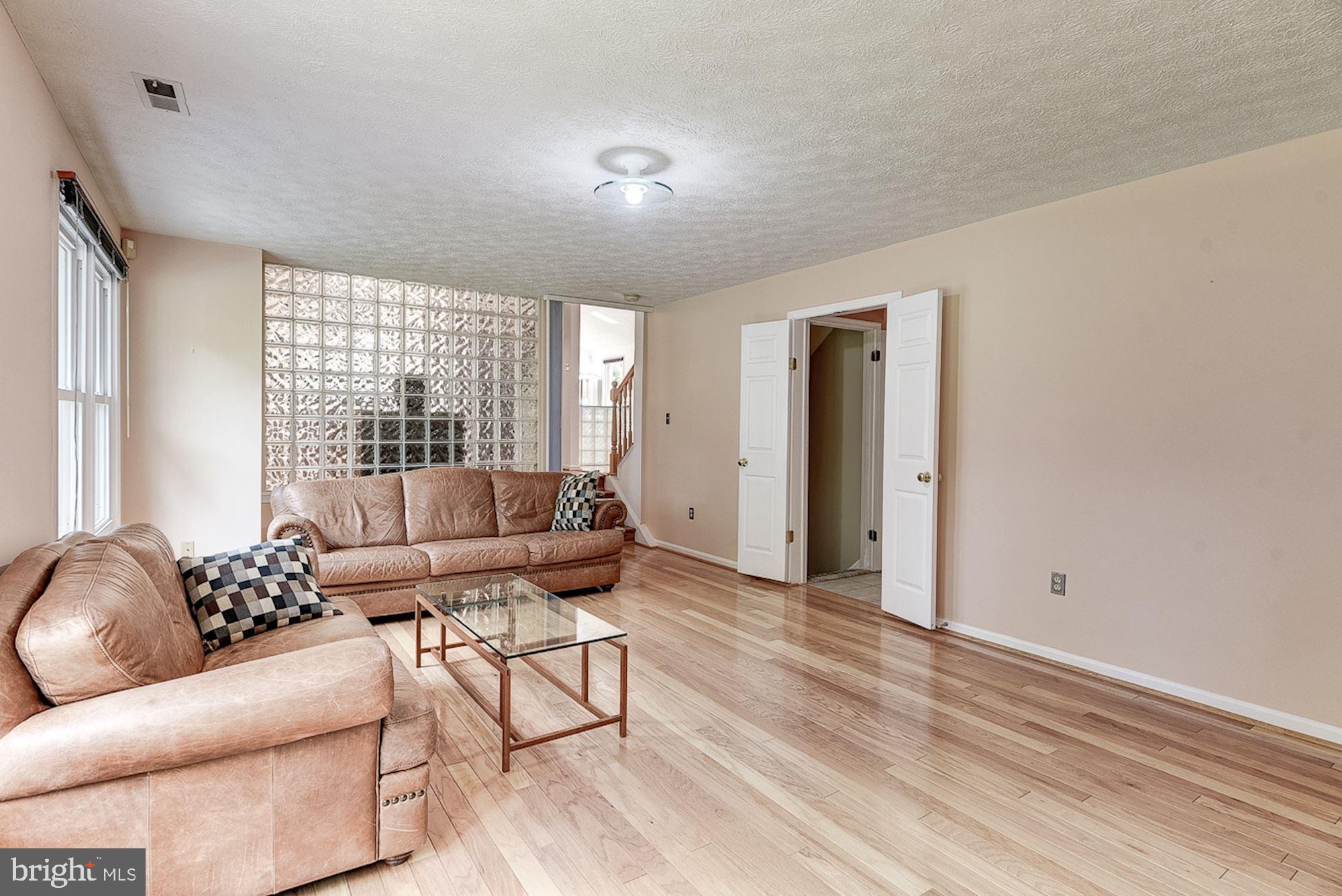 3221 Sharp Road Glenwood, MD 21738 - Photo 27 of 53 Family Room | Hardwood Floors