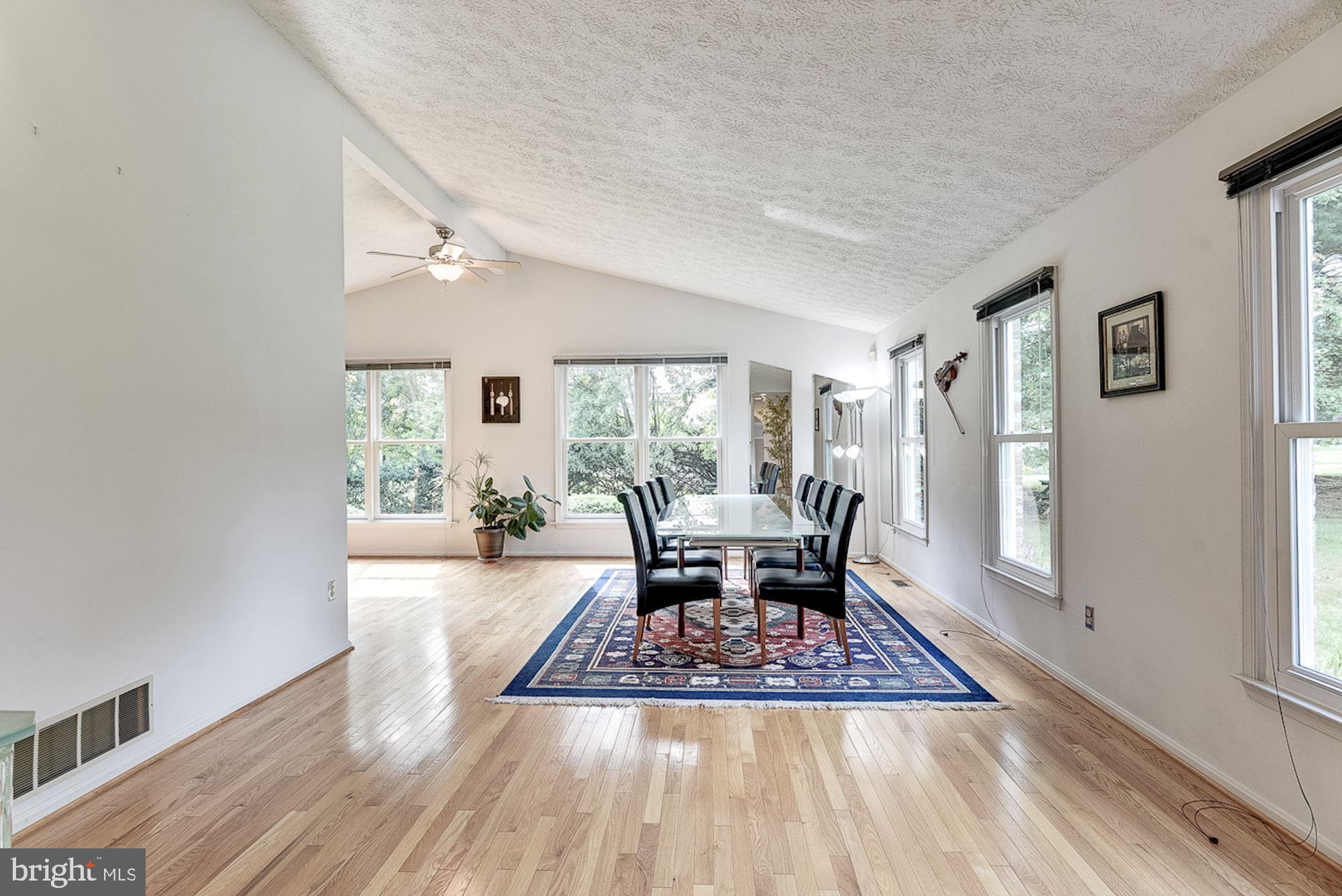 3221 Sharp Road Glenwood, MD 21738 - Photo 5 of 53 Living Room | Hardwood Floors | Vaulted Ceilings