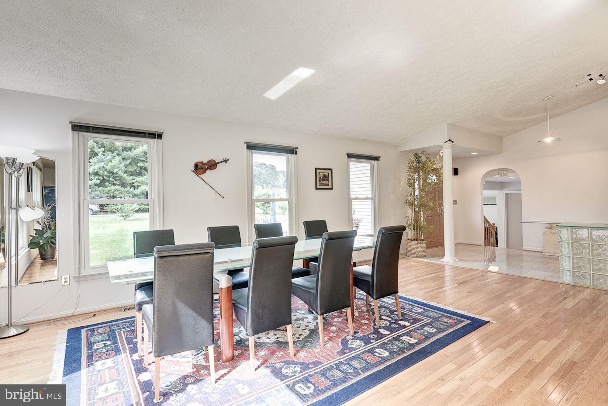 3221 Sharp Road Glenwood, MD 21738 - Photo 6 of 53 Living Room | Hardwood Floors | Vaulted Ceilings