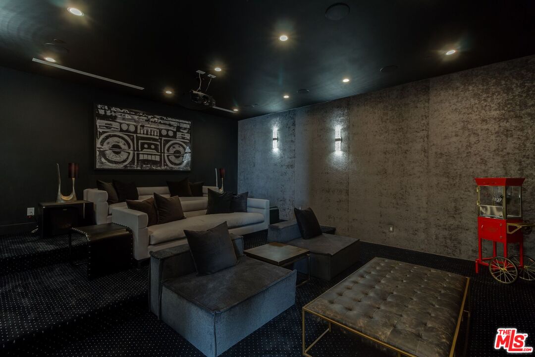 12119 Travis Street Los Angeles, CA 90049 - Photo 24 of 26 a living room with furniture