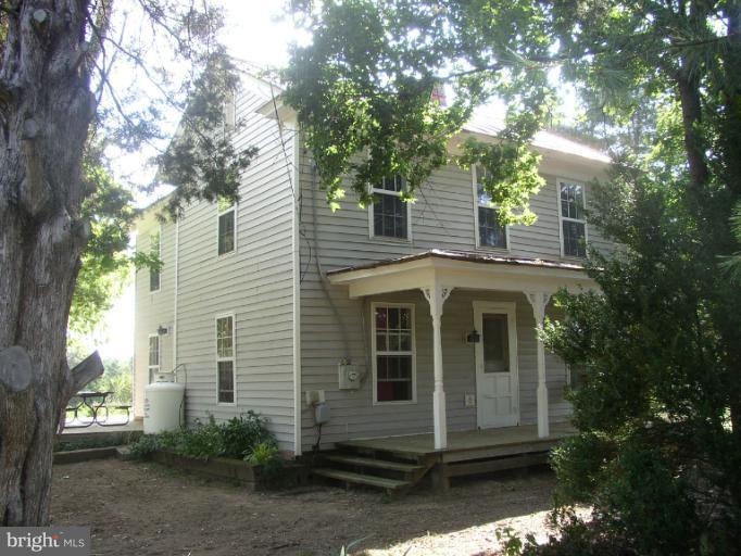 933 Guard Hill Road Middletown, VA 22645 - Photo 1 of 26 a view of a house with a yard