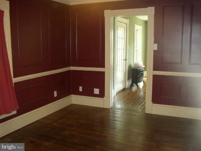 933 Guard Hill Road Middletown, VA 22645 - Photo 22 of 26 a view of gallery with wooden floor
