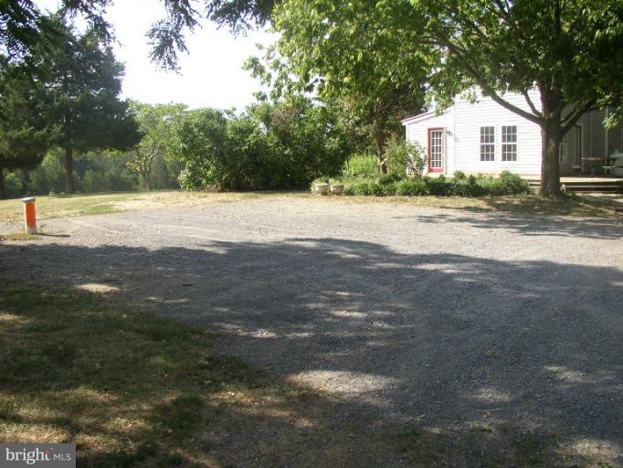 933 Guard Hill Road Middletown, VA 22645 - Photo 7 of 26 a view of house with yard