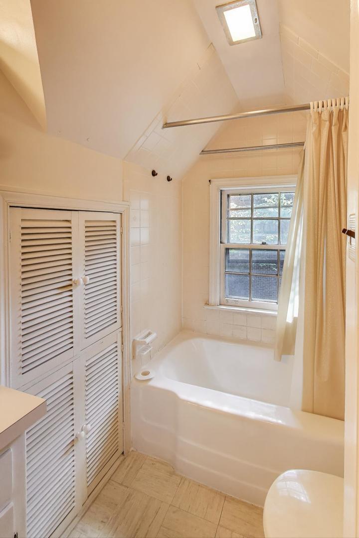 2113 Forestview Road Evanston, IL 60201 - Photo 16 of 18 a white bath tub sitting next to a white sink