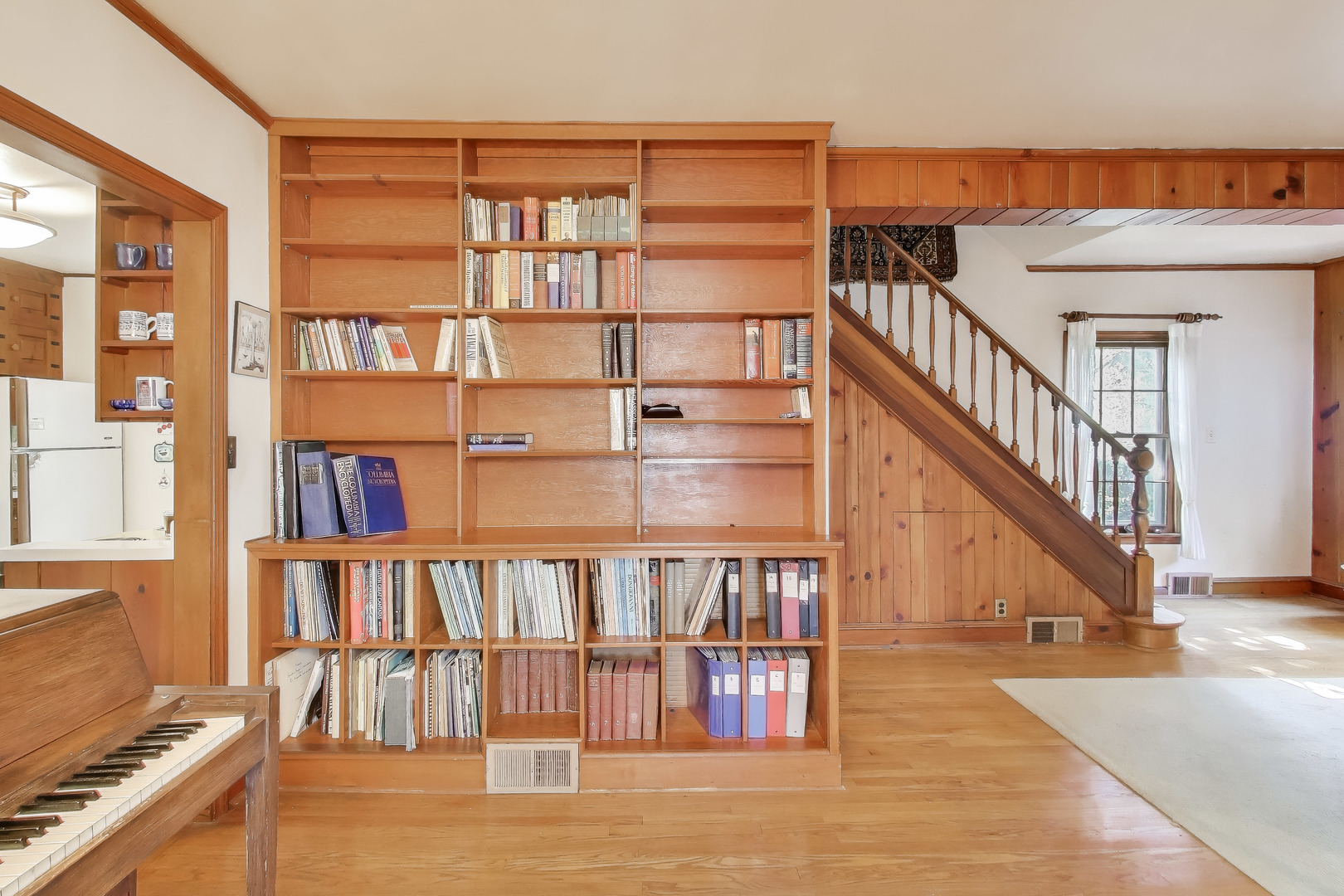 2113 Forestview Road Evanston, IL 60201 - Photo 4 of 18 a view of staircase with white walls and a window