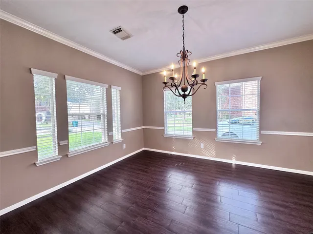 a view of an empty room with a fireplace