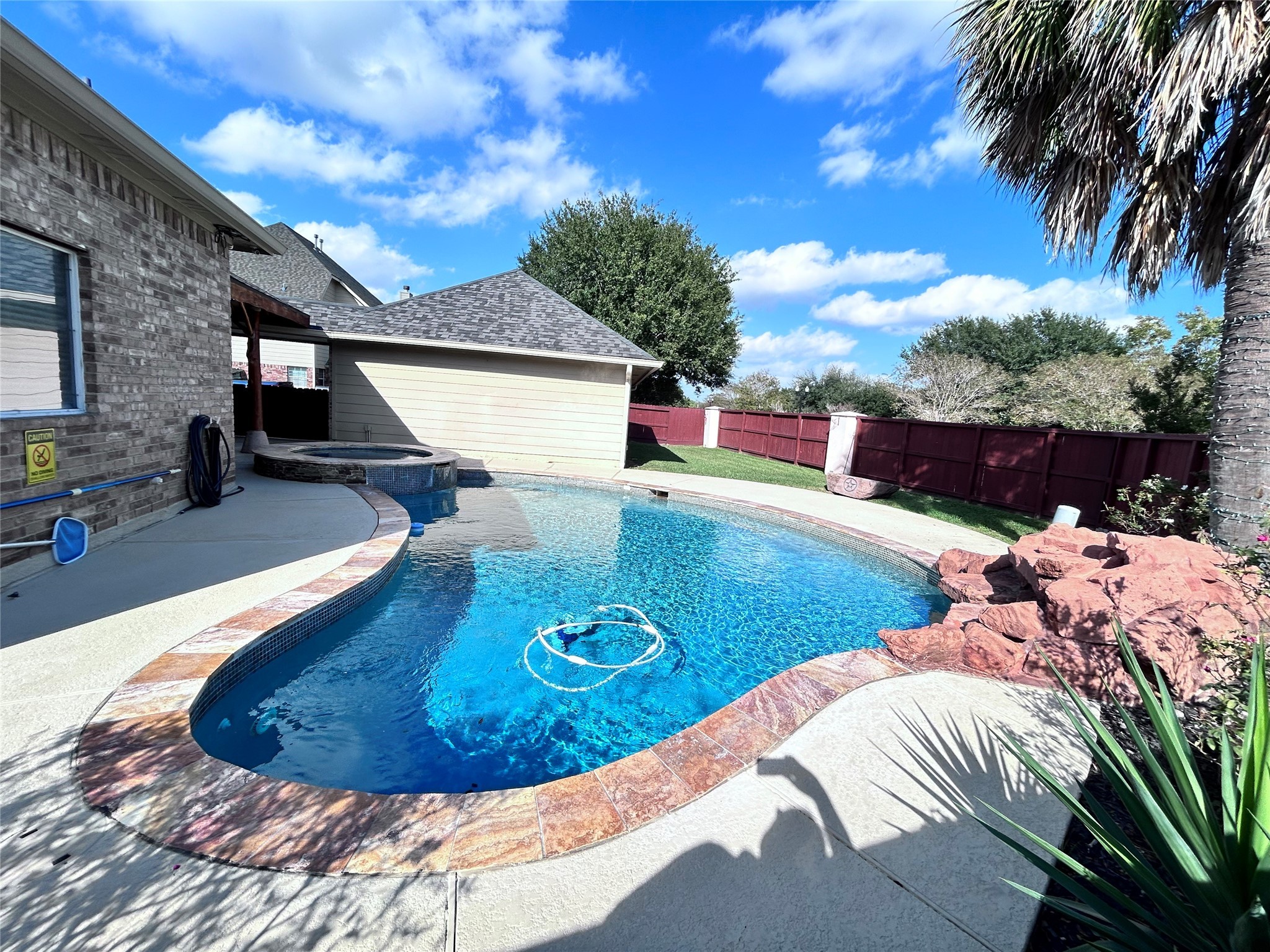 3411 Bay Breeze Drive Seabrook, TX 77586 - Photo 43 of 46 a view of a swimming pool with a patio