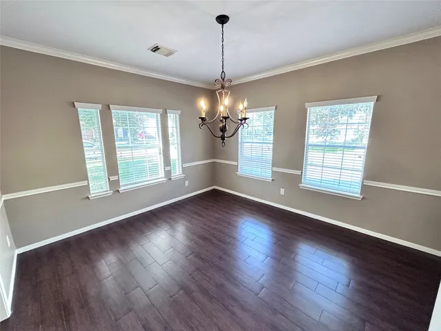 a view of a room with an empty space