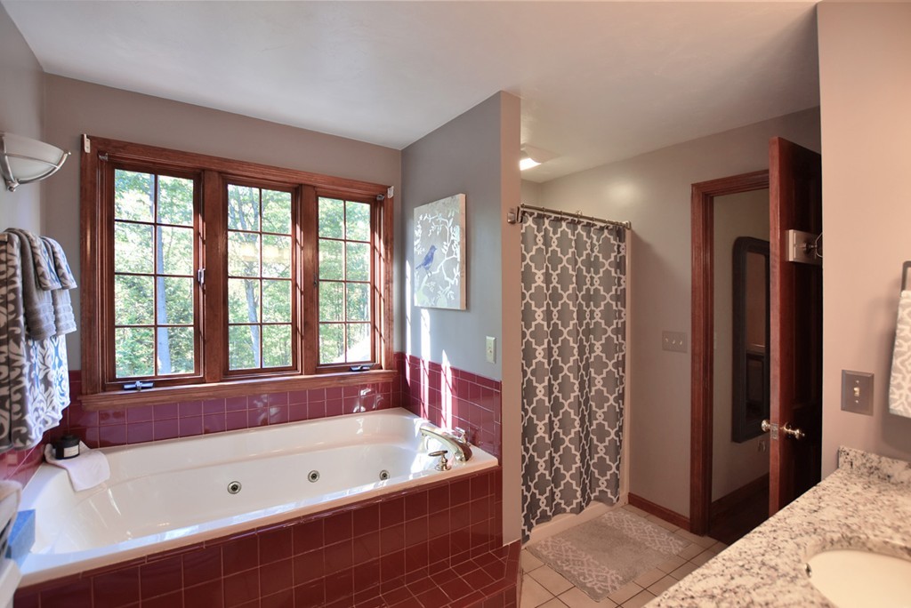 7 Rufus Putnam Place Rutland, MA 01543 - Photo 18 of 24 a bathroom with a bathtub a sink and a shower