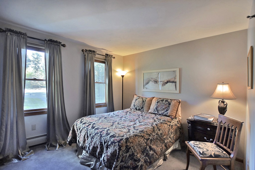 7 Rufus Putnam Place Rutland, MA 01543 - Photo 19 of 24 a bedroom with a bed and wooden floor