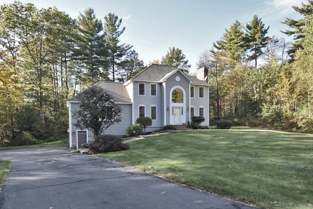 7 Rufus Putnam Place Rutland, MA 01543 - Photo 2 of 24 a front view of a house with a yard