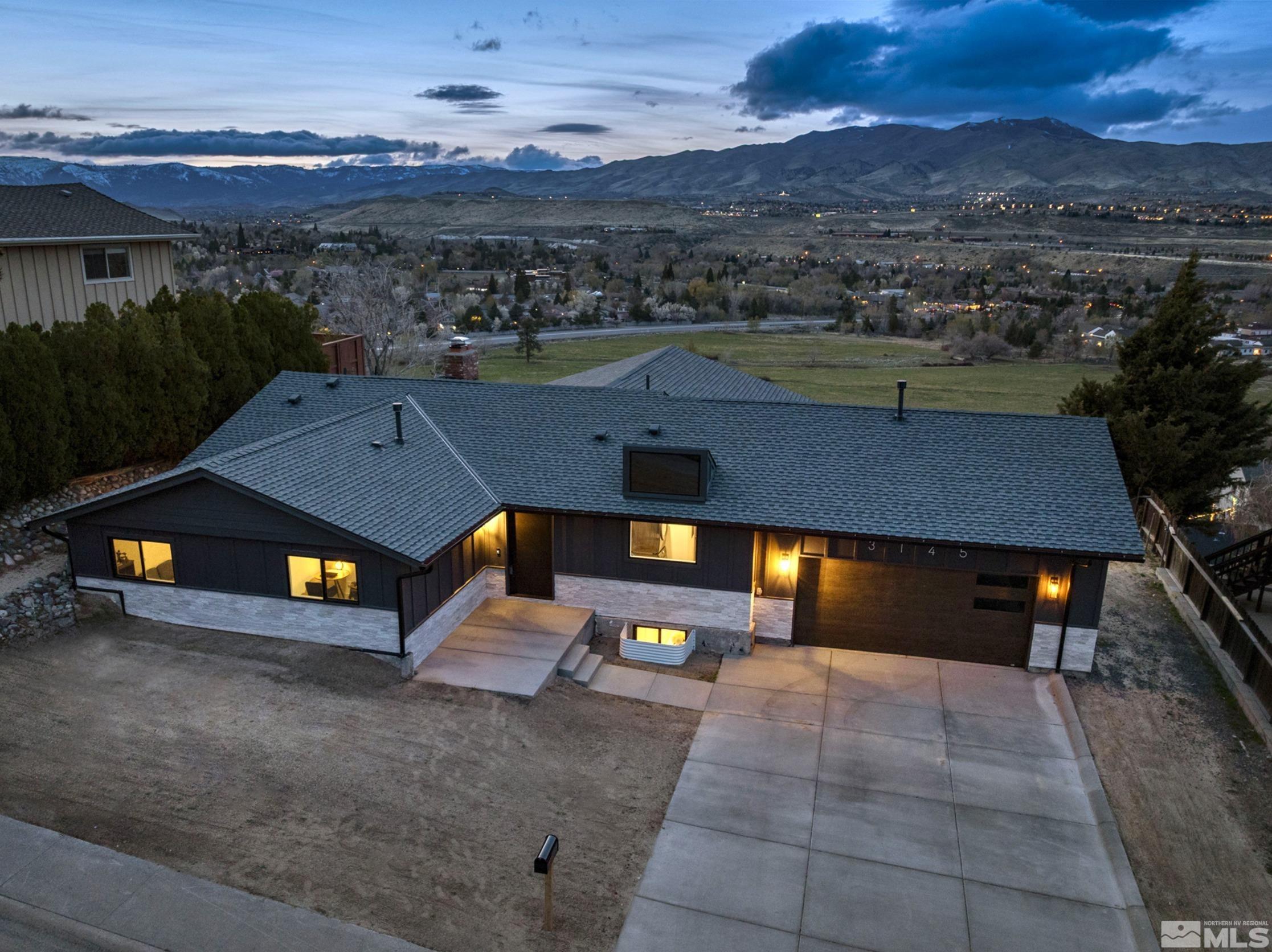 3145 Heatheridge Lane Reno, NV 89509 - Photo 1 of 39 an aerial view of a house with a yard