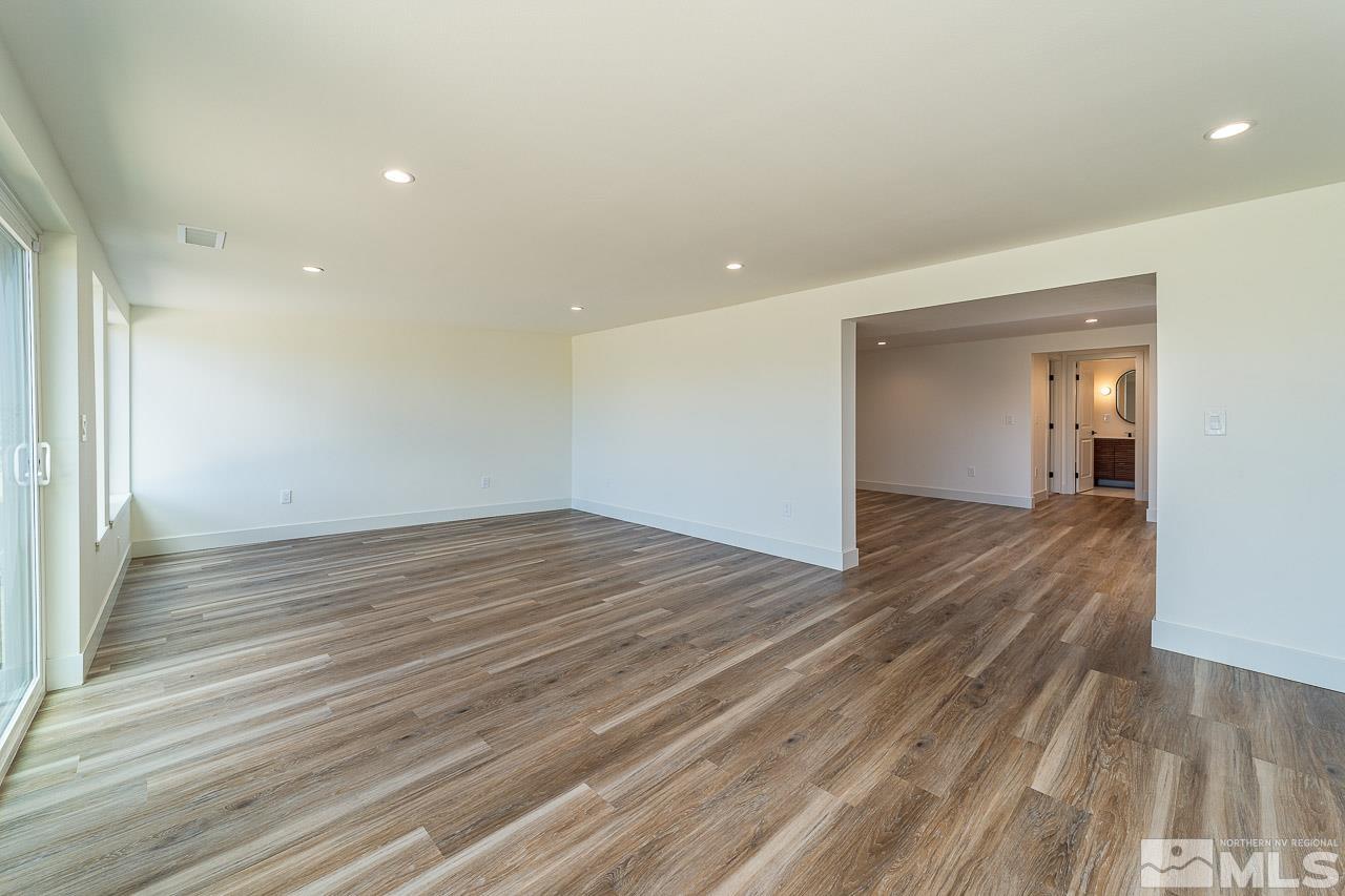 3145 Heatheridge Lane Reno, NV 89509 - Photo 28 of 39 a view of empty room with wooden floor