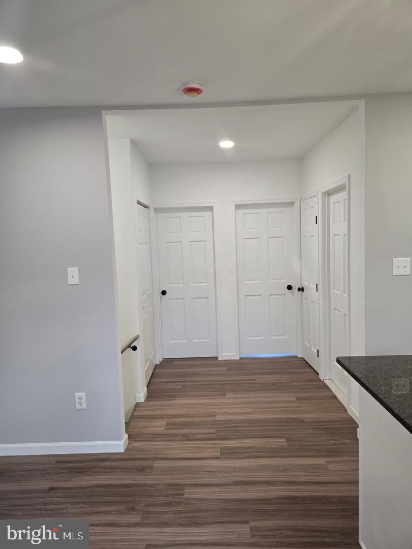 834 South Cecil Street Philadelphia, PA 19143 - Photo 4 of 10 a view of a room with wooden floor and white walls