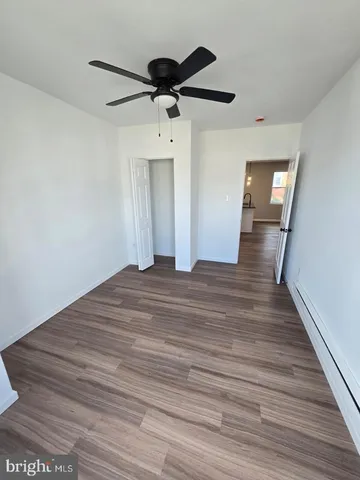 a view of a livingroom with wooden floor
