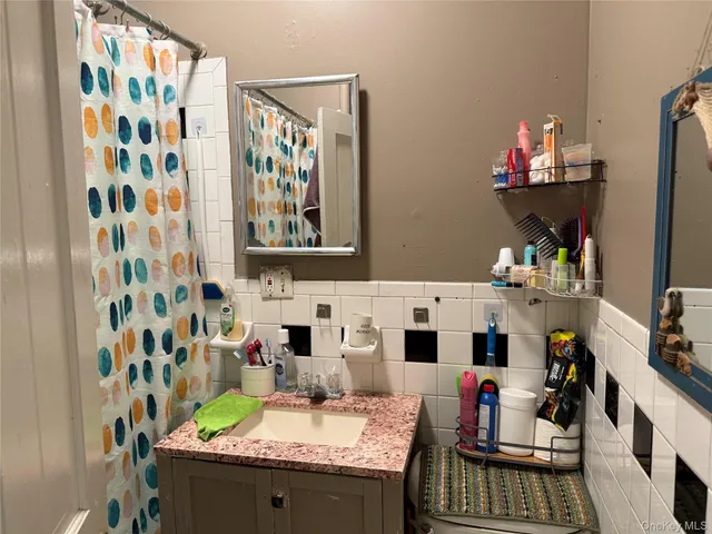 a room with gym equipment and a window