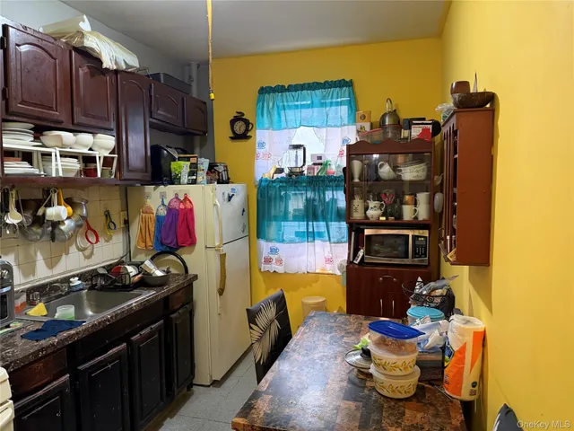 a bedroom with bed and a window