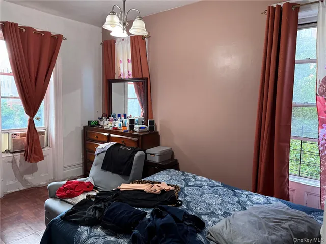 a bathroom with a sink toilet and a mirror