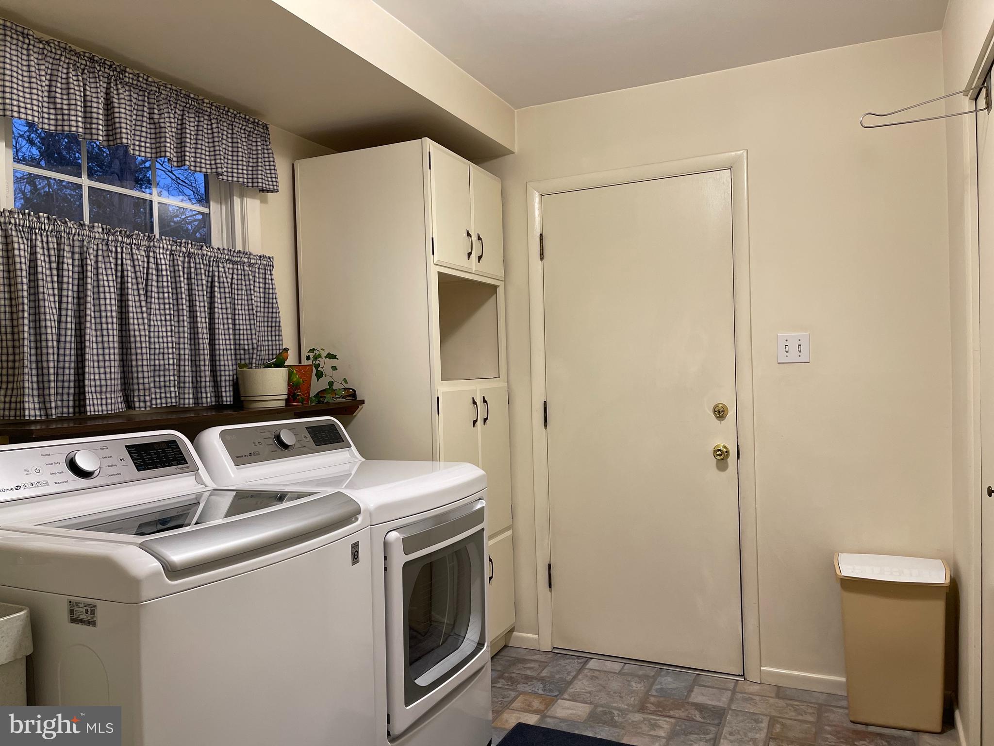 6422 Meriwether Lane Springfield, VA 22150 - Photo 14 of 36 Laundry Room w/storage cabinets & Laundry Chute