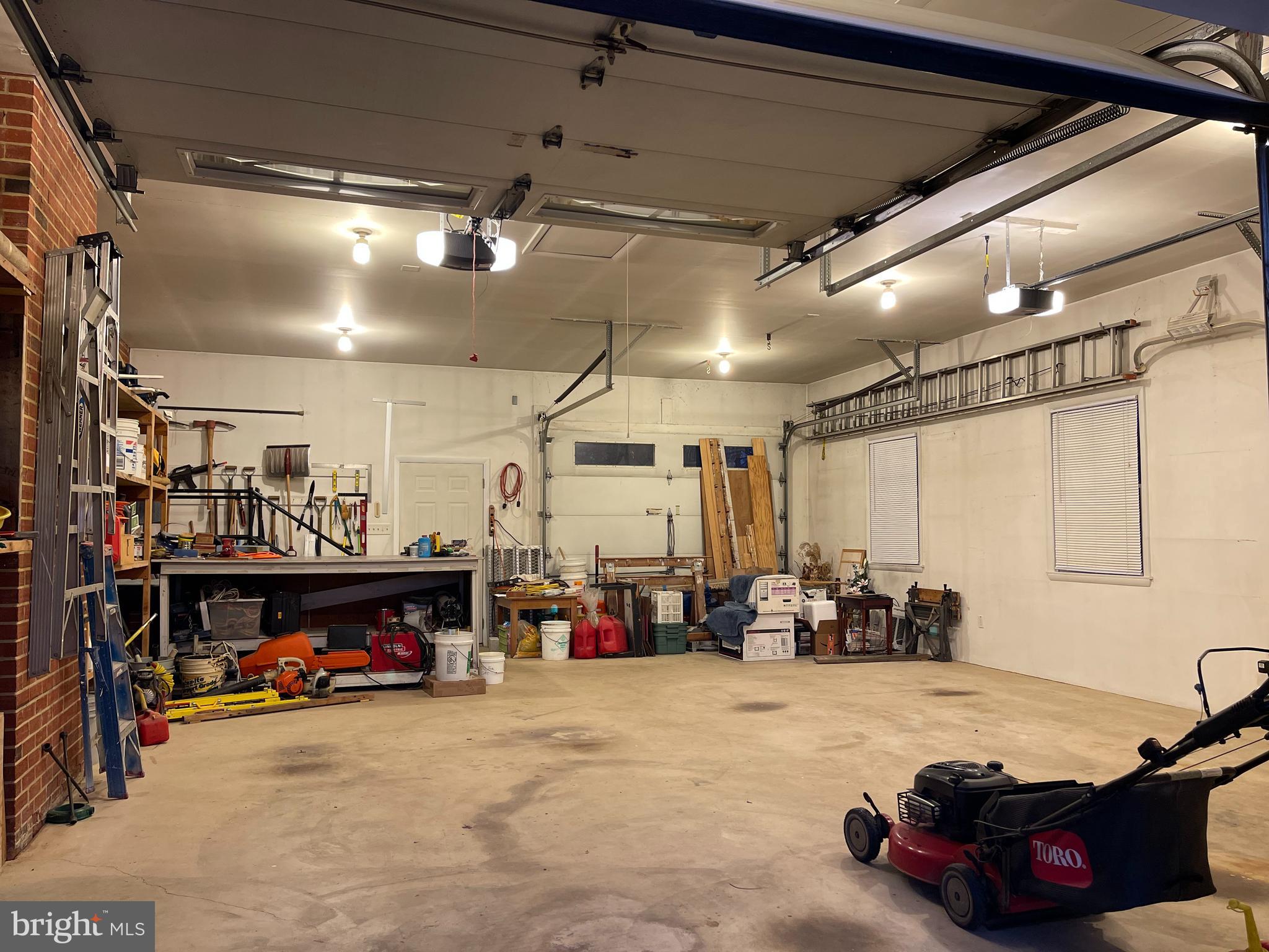 6422 Meriwether Lane Springfield, VA 22150 - Photo 31 of 36 Oversized Garage with 3 Doors