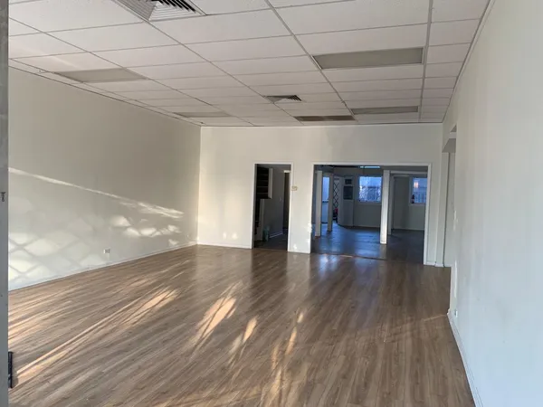 a view of livingroom with wooden floor