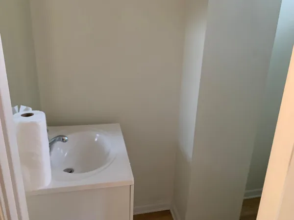 a bathroom with a toilet and sink