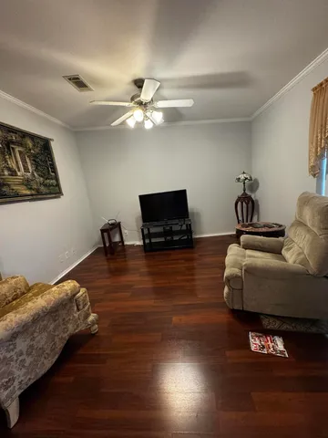 a bedroom with bed and a window