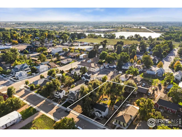 a view of a city with an ocean