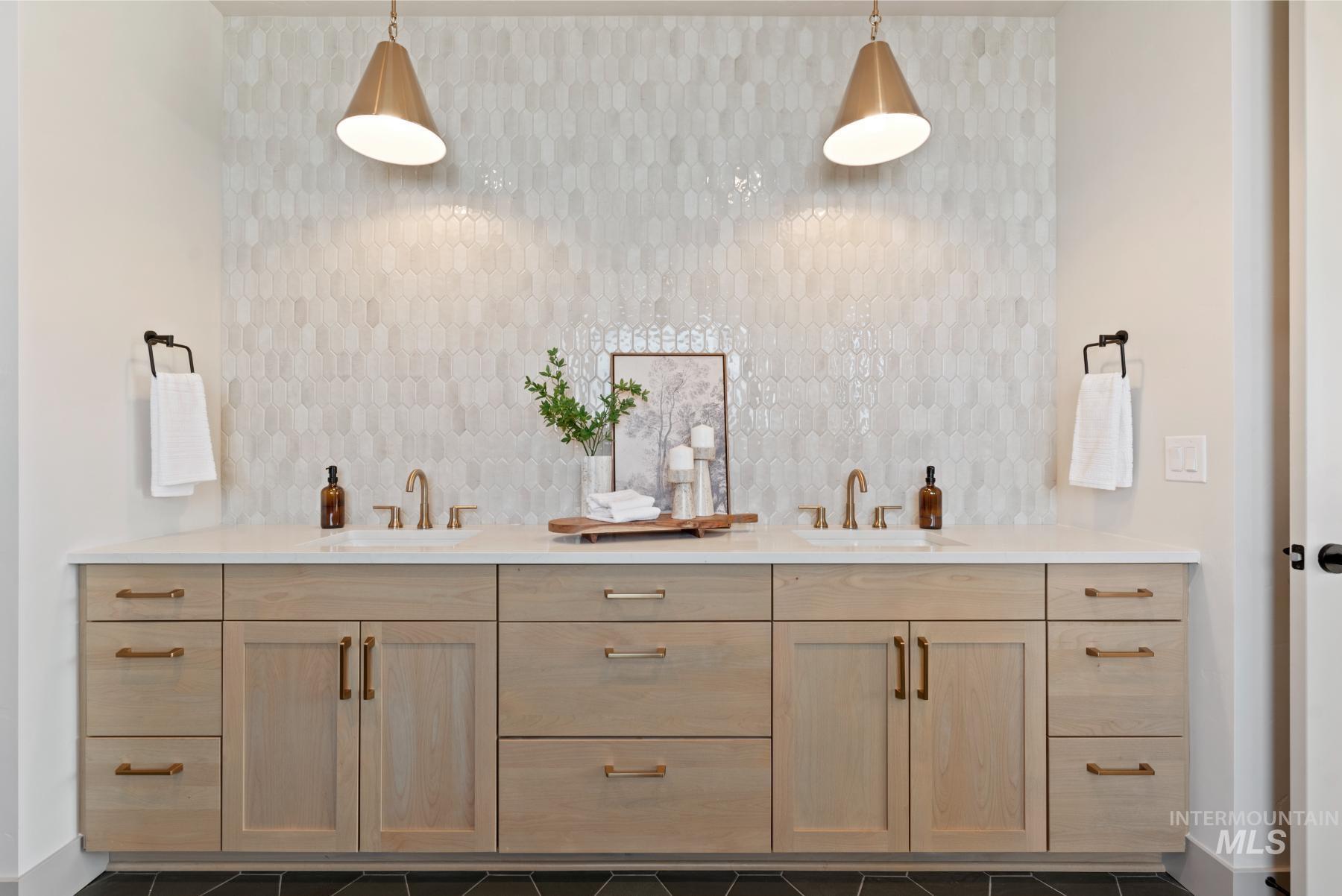 8530 West Graye Street, Unit SHASTA Meridian, ID 83646 - Photo 19 of 28 Full bath with double vanity and baseboards