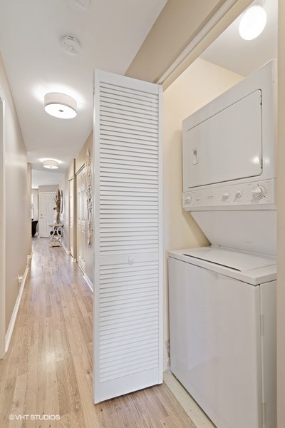 649 West Division Street, Unit B Chicago, IL 60610 - Photo 14 of 15 a view of a hallway with closet and wooden floor