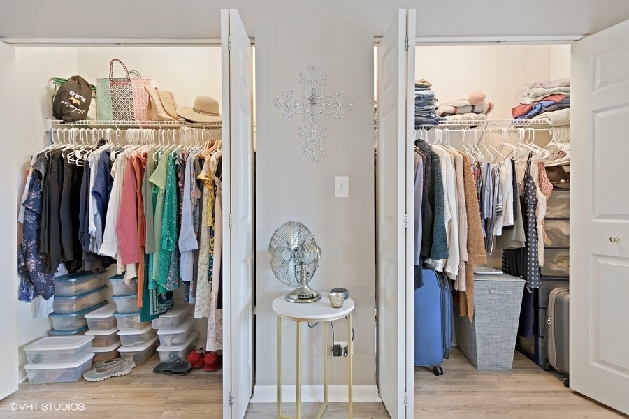 649 West Division Street, Unit B Chicago, IL 60610 - Photo 10 of 15 a view of walk in closet with clothes and shoes