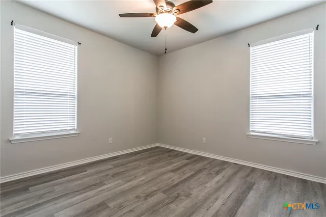 a view of a room that has a window in it