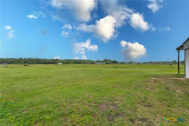 a view of a lake and sunset