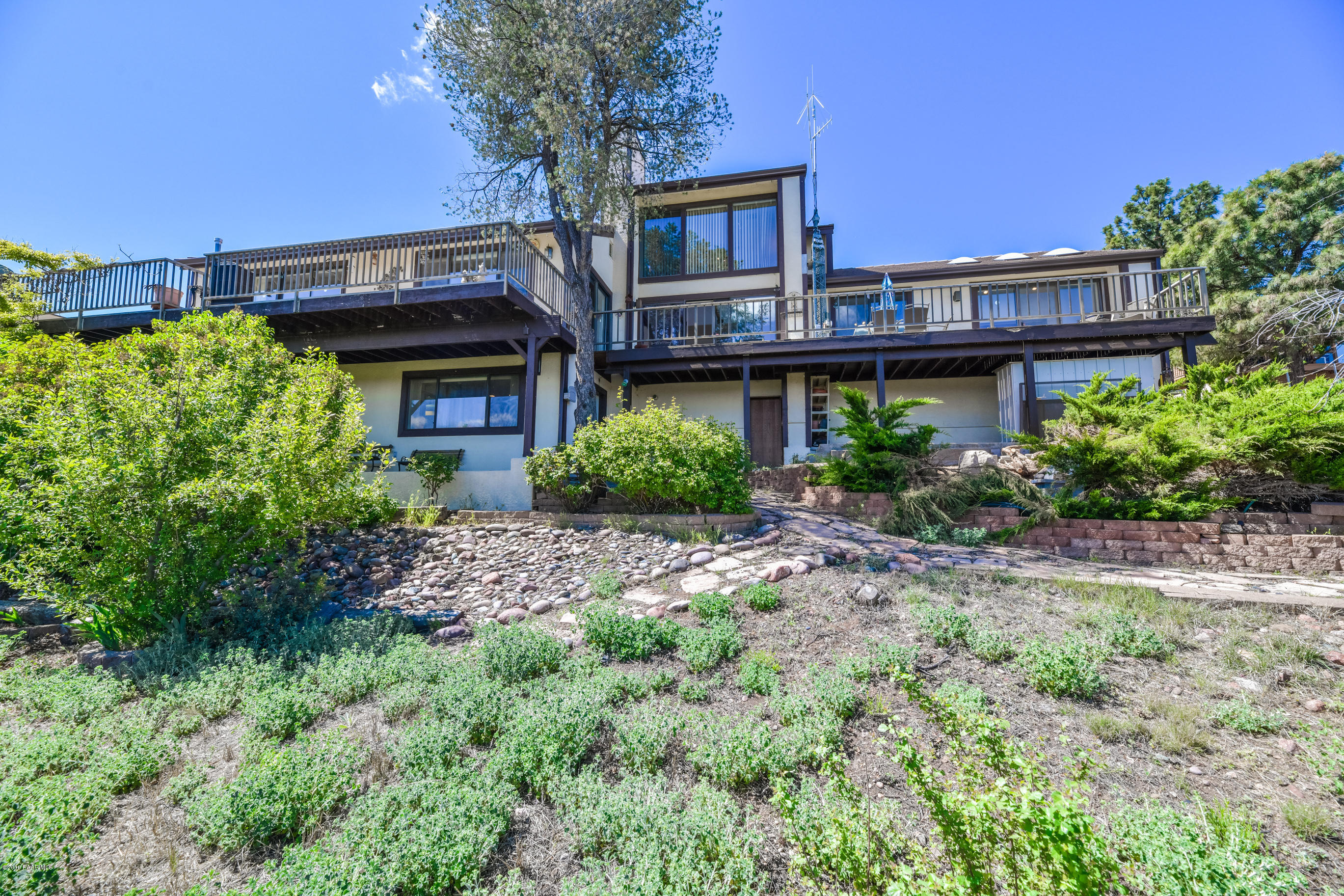2480 Ridge Road Prescott, AZ 86301 - Photo 54 of 64 a front view of a house with garden