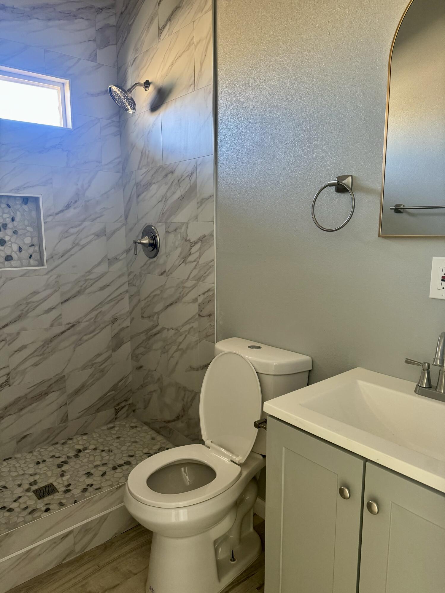 2405 Monterey Avenue, Unit 2 Thermal, CA 92274 - Photo 6 of 6 a bathroom with a toilet and a sink