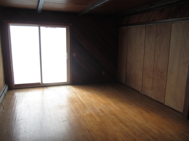 60 Walters Lane Raphine, VA 24472 - Photo 8 of 11 a view of a small space with wooden floor and a window