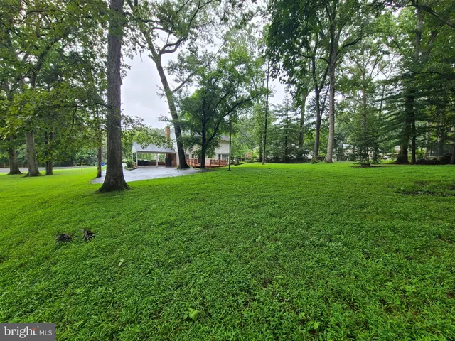 a view of a house with a big yard