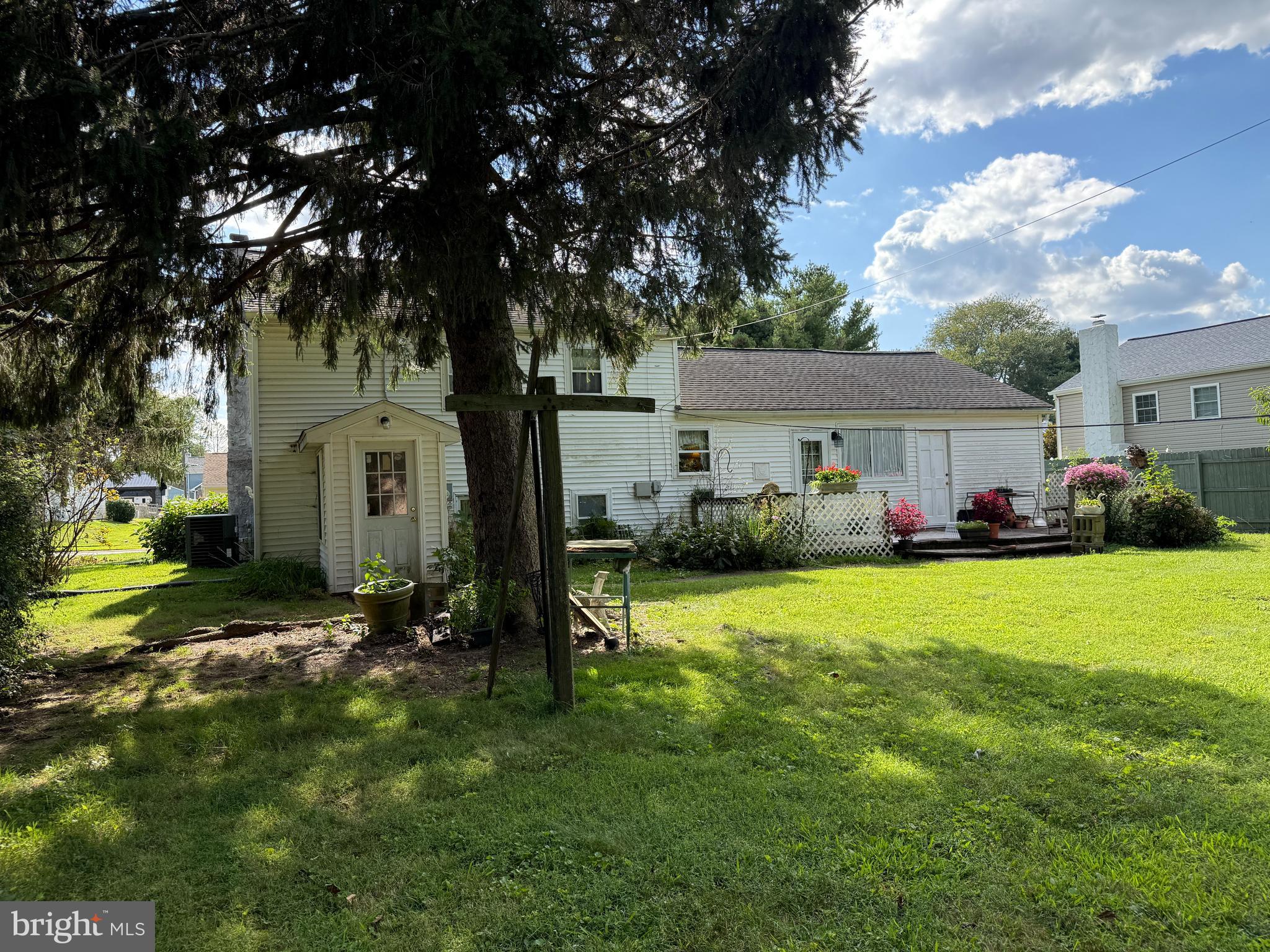 13 Cynthia Road Newark, DE 19702 - Photo 2 of 3 a front view of house with yard and seating area