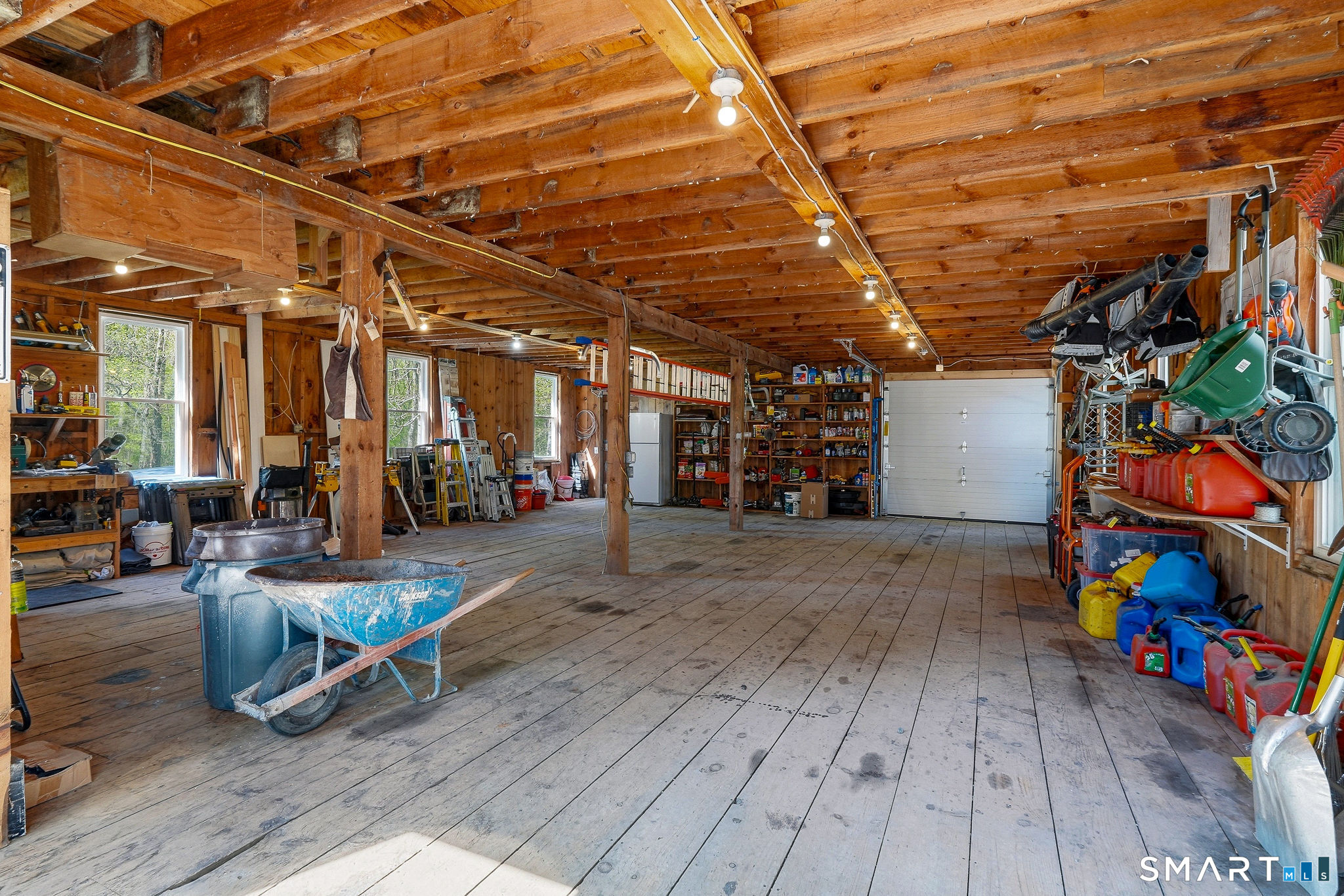 61 Mystic Road North Stonington, CT 06359 - Photo 36 of 40 a view of a room with wooden floor