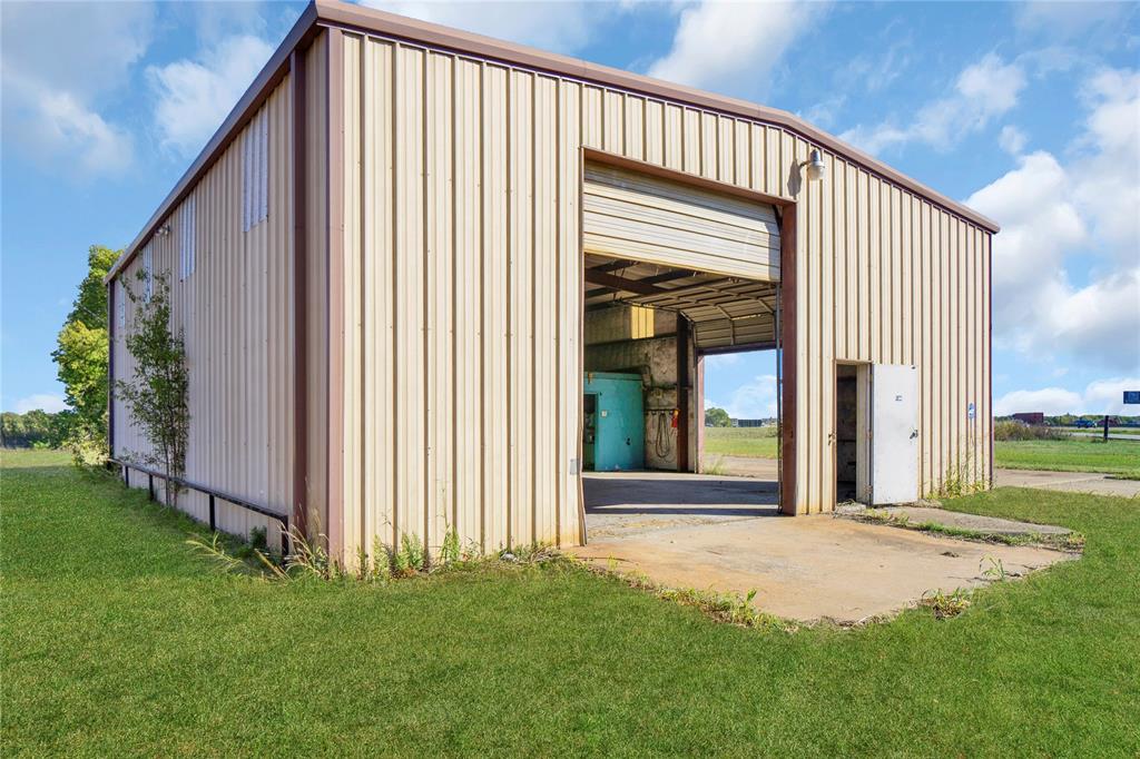 6000 Interstate 30 Fate, TX 75087 - Photo 13 of 18 a view of a house with backyard